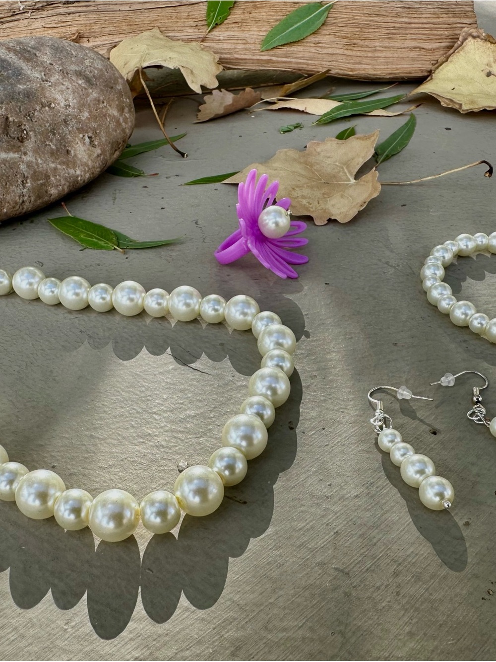 Costume pearl necklace with matching earrings, bracelet, and ring